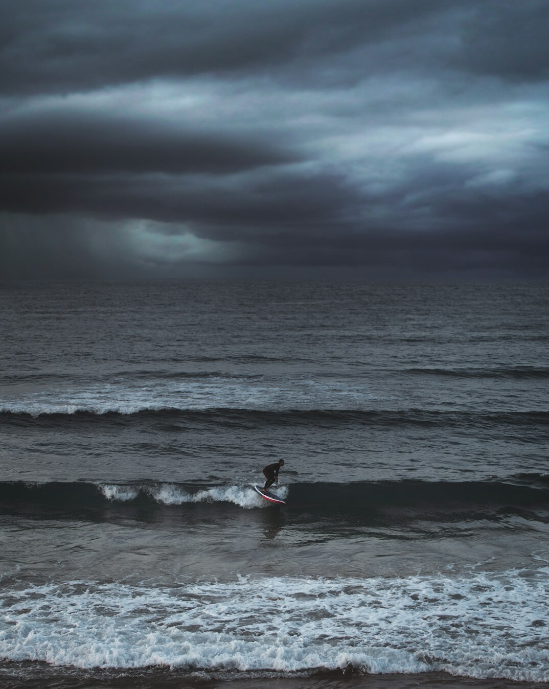 fisherman on boat in storm