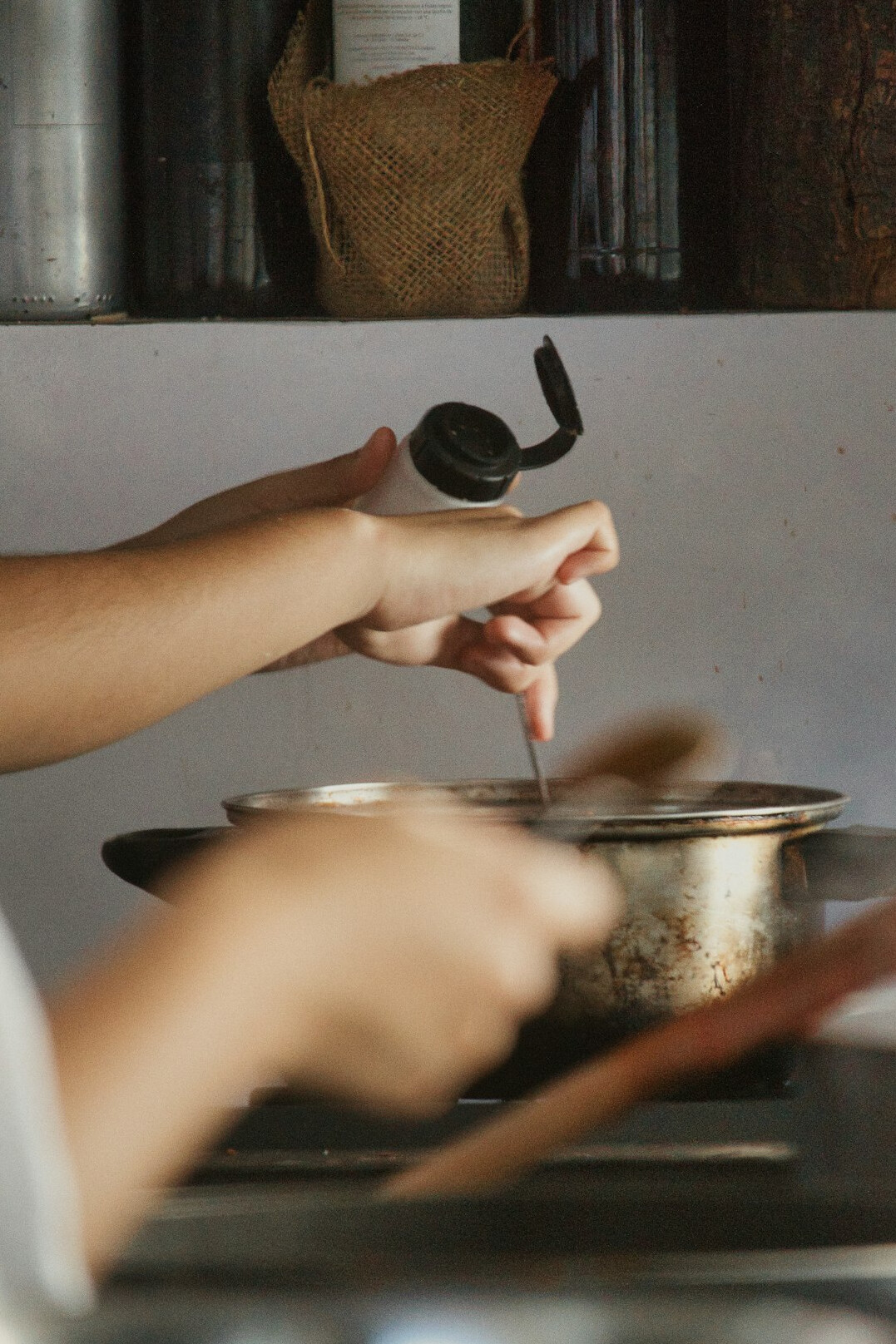 woman cooking in kitchen
