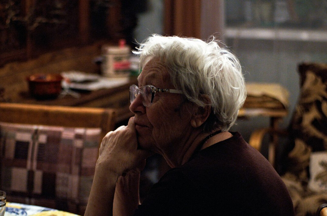 elderly woman sharing memories