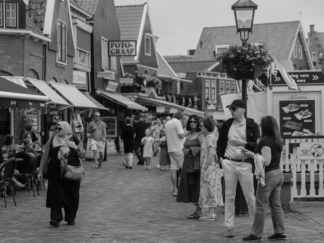 women chatting in village square